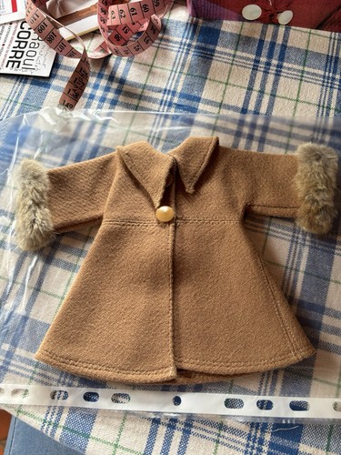 Vêtements pour poupée