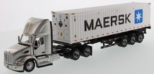 DIECAST MASTERS, PETERBILT 579 6x2 avec porte container et container 40 Pieds...