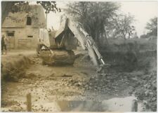 Drought in several regions of France. Excavator. 1969.