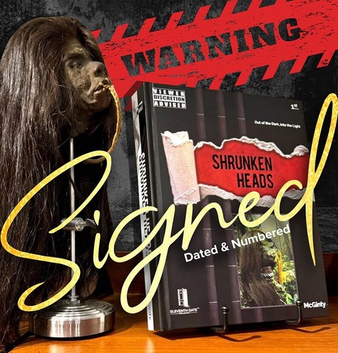 Signed shrunken heads book - ,