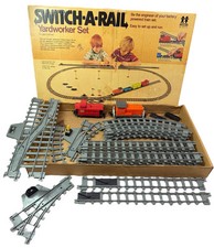 Vintage TOMY Switch-A-Rail Yardworker Set w/ Train Engine & Caboose UNTESTED
