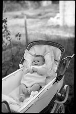 Child baby in pram - old photo negative year. 1930