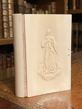 Reliure ivoirine applique en