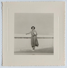 Women's chic smiling pin up dress - vintage photo snapshot c. 1950