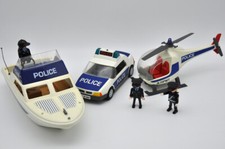 lot Playmobil voiture de police + hélicoptère + bateau + 3 policiers