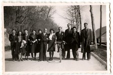 Group young people walk road