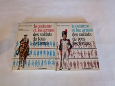 le costume et les armes des