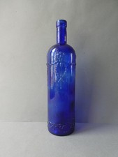 grande bouteille en verre bleu