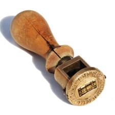 Ancien tampon mécanique en