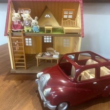 Maison et voiture Sylvanian Families et famille de lapins