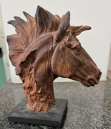 Wooden horse head sculpture