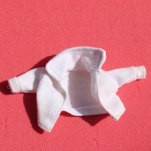 Gilet blanc pour poupée