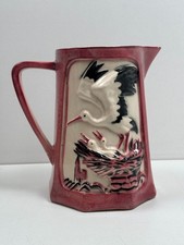 Ancien Pichet en Barbotine Faïence de Saint Clément Décor Cigognes