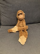 plush monkey long legs scratch