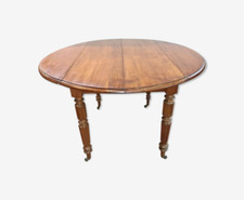 Table ronde 4 pieds en merisier avec  allonges