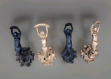 Set of 4 pretty cast iron hangers, fauna and mermaids late 19th early 20th century