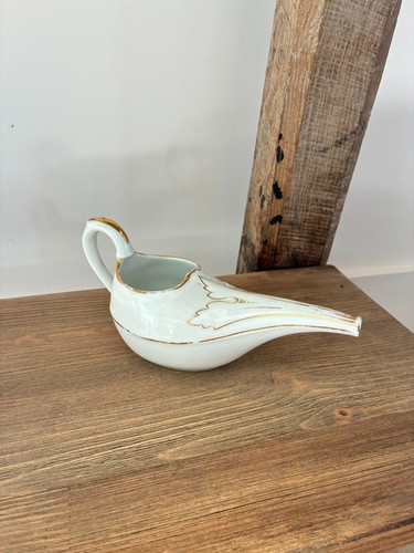 Ancien biberon malade - de,