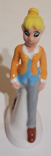 Tome janry figurine feve - &,