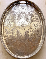 Ancien plateau à thé marocain en métal argenté, un poinçon au dos, D. 48 x 35 cm