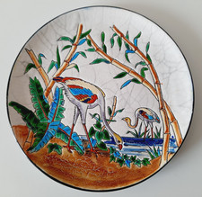 Assiette emaux décor