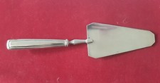 PELLE A TARTE EN METAL ARGENTE POIDS/ 90 GR.ART DECO 24,5 cm