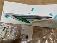 UN AUTOCOLLANT ORIGINE DE