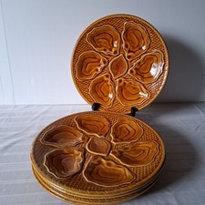 5 assiettes à huîtres ou coquillages brunes en bon état