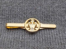 PINCE  A  CRAVATE  -  GENIE  -  METAL  DORE