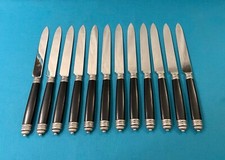 12 grands couteaux CHRISTOFLE décor RUBANS EMPIRE métal argenté & ébène 24,5 cm