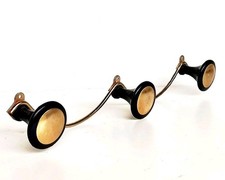 PORTE MANTEAUX NOIR ET DORÉ A