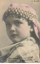 Child - Portrait of a girl wearing a scarf over her head