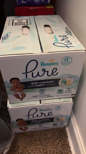 New born pampers - born,