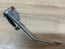 UNE BEQUILLE LATERALE RESSORT