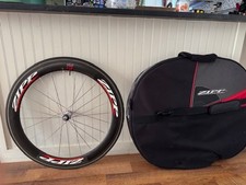 Zipp 404 carbon bicycle wheel with padded double wheel bag and extra parts