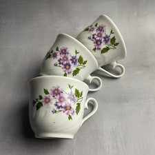 Trio de tasse en porcelaine de Bavière Bavaria Kronester décor de fleur violette