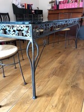 Table en fer forgé et verre