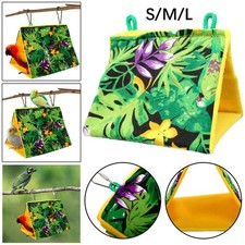 Oiseau perroquet nid suspendu