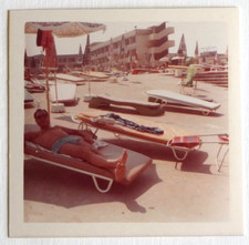 Man lying deckchair beach holiday Morocco? Vintage snapshot photo c. 1970