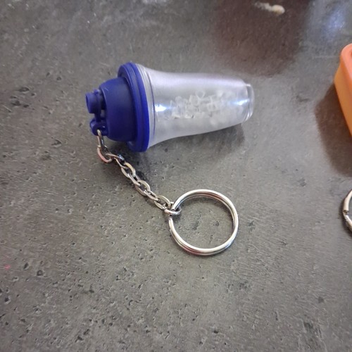 Porte clefs tupperware - porte,