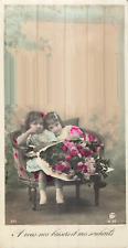 CP TO YOU OUR KISSES - LITTLE GIRLS SITTING ON SOFA AND BEAUTIFUL BOUQUET FLOWERS