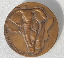 SERVICE DES CHASSES -MEDAILLE INSIGNE PLAQUE DE BAUDRIER ?  elephant AFRIQUE