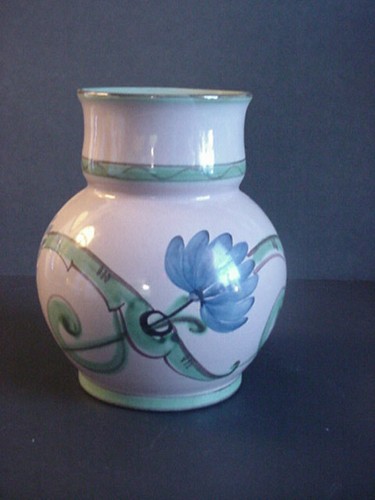 Hand made pottery vase - hand,