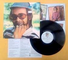 Elton John " Rock Of The