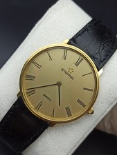 MONTRE À QUARTZ ICONIQUE ETERNA GENEVE SWISS MADE 70s GOLDEN DIAL RARE