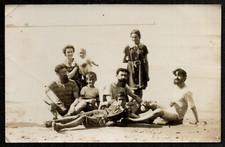 Curious family of beards at the beach. circa 1910