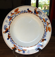 rare et jolie assiette creuse