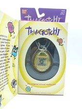 Tamagotchi Original P1/P2 clear yellow Bandai 1997