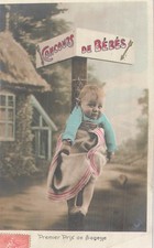 CP BABY CONTEST - BABY HANGING FROM POLE - 34423
