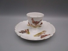 Coquetier ancien en porcelaine