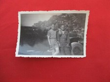 OLD MILITARY PHOTOGRAPH IN FRONT OF A VEHICLE